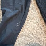 Lululemon  Super High Rise Black Leggings with Pockets and Seam Details Photo 1