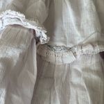 Aritzia Sunday best  boho coquette smocked mini ruffle skirt size small Photo 8