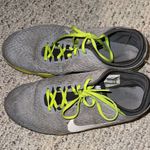 Nike Gray with Neon Yellow Accents Running Shoes Photo 0