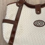 White & brown weaved faux leather purse Photo 1