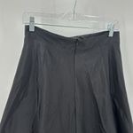 Onyx Nite Onyx a-line black light sheen lil bit of tulle under back zip skirt size M Photo 4