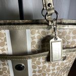 Coach Chelsea Heritage stripe Stylish Beige and Gold Tote Bag Photo 6