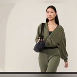 Athleta  Seasoft Bubble Hem Full Zip Aspen Olive Green size medium Photo 2