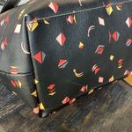 Fossil Black Tote with Pink, Red and Yellow Geometrical Designs Photo 4