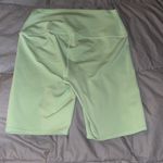 Alo Yoga  Green Bike Shorts High-Rise Performance Photo 3