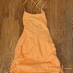 Salty  Ruched Hem Lace Up Back Mini Dress Orange size S Photo 0