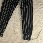 La Gypsy Black and White Striped Pants with Tie Waist Photo 4