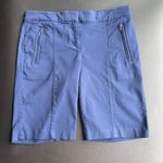 IZOD Lady  Golf Shorts Sz 4 stretchy Four pockets  Two front with zipper Photo 0