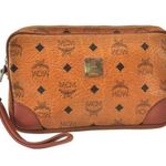 MCM  Brown Clutch with Logo Pattern and Wrist Strap Photo 0