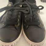 Guess Black Leather Low-Top Sneakers with Gold Accents Casual Fashion Shoes 7.5 Photo 0