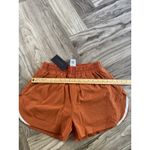 Alphalete  Woman’s Infinity Stride Short W/ Liner - Sour Tangerine, Size Medium Photo 5