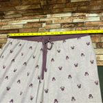 Disney  Women’s Pajamas in Cream and Purple size L Photo 3