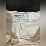 Abercrombie & Fitch Women's Cream Shorts. Abercrombie. Relaxes cutoff short. High rise Photo 1