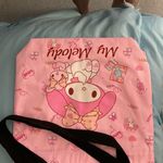 My Melody Bag. NWT Pink 14 1/2” Long x 13” Wide x 13” Deep. Black handle Photo 1