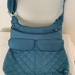 Travelon  RFID Anti Theft Aqua Blue Quilted Crossbody Travel Bag Pockets Purse Photo 1