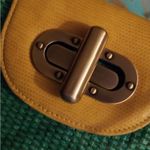 ALDO Green and Yellow Woven Clutch Photo 8