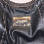 Jaclyn Smith  black twisted strap shoulder bag Photo 2
