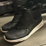 Nike Women’s Air Maxx Thea. Black simple high top pull on sneakers Photo 0