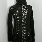 Hunter Sleeping on snow/ Green sweater dress Photo 3