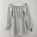 Pretty Little Thing white and black striped long sleeve off the shoulder romper Photo 0