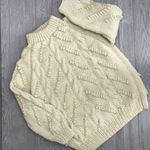 Handmade crochet cotton knitted sweater with pom poms and braids oversized Photo 0