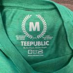 Women’s Green Jurassic Park Search & Rescue Short Sleeve Baby Tee, Size Medium Photo 3