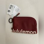 Lululemon  NWT Clippable Card Pouch Burgundy Wristlet Photo 3