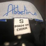 Abbeline  Size small women’s black with gold design V-neck blouse Photo 5