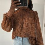 ee:some Cheetah print top Photo 0