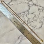 Gold tone dainty flower necklace Photo 4