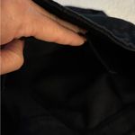 Minimalist Black Shoulder Bag with Crescent Shape Photo 6