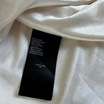 Bebe Watercolor Floral Sleeveless
Scuba Fit and Flare Mini Skater Dress Photo 7