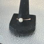 Moissanite 3/4 of a carrot platinum over sterling silver with gold. Size 10 1/4. Photo 0