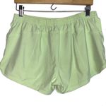 Athleta  Neon Pastel Green Athletic Shorts Medium Photo 1