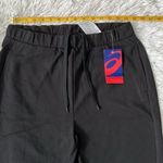 ASICS  Women’s ESNT Jogger pants 0904 black size Large Photo 4