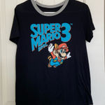 Nintendo EUC |‎ Super Mario Bros 3 women’s scoop neck graphic tshirt — medium Photo 0