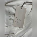 A New Day White Short Sleeve Bodysuit Photo 5