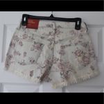 Mossimo | Floral Print High Rise Raw Hem Jean Shorts White Size 4 Photo 1