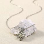 Glow in the dark lotus necklace Photo 3