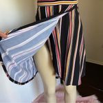 Cute black, pink, and yellow striped faux wrap dress. Black Photo 2