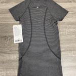 Lululemon Swiftly Tech Short-Sleeve Shirt 2.0
Hip Length - Spandex Black & White Stripe Photo 3