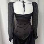 We Wore What Black   Puff sleeve mini dress. Photo 1