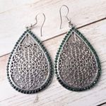 Large Silver Tone Ornate Dangle Earrings with Green Gems Photo 0