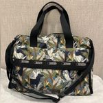 LeSportsac Boston bag jungle/safari-themed print. Weekender Crossbody Bag Photo 1