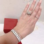 Valentino Garavani Authentic White & Black Thin Leather VLTN Buckle Bracelet Photo 3