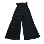 Peyton Jensen  black strapless jumpsuit Photo 1