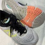 New Balance White and Black Athletic Shoes with Lime Accents Photo 7