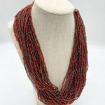 Layered red and brown multistranded statement necklace Red Photo 0