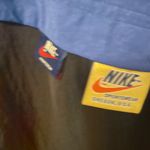 Nike Black and Blue Windbreaker with Red Accents Photo 4