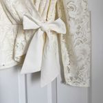 EXPRESS NWT Cream Lace Wrap Top with Bow Tie Side Size M Photo 6